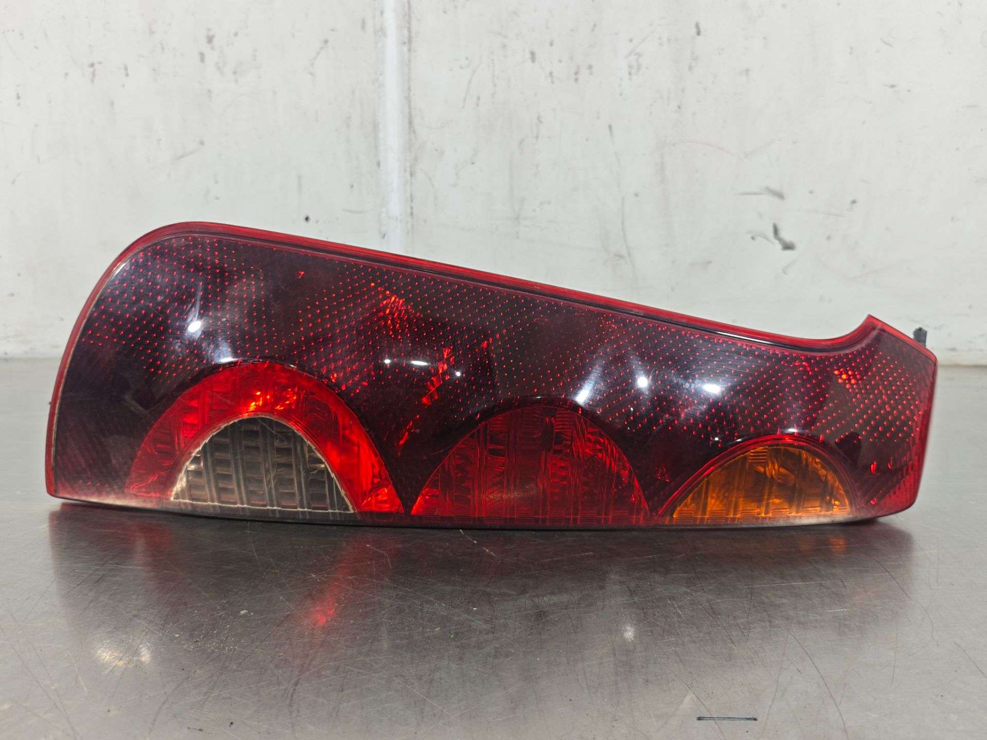 Piloto trasero izquierdo 22016752 de Nissan Note (e11, ne11) 2006-2012 86 CV